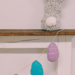 How to Make a DIY Stuffed Bunny | DIY bunny stuffy sitting on a mantel